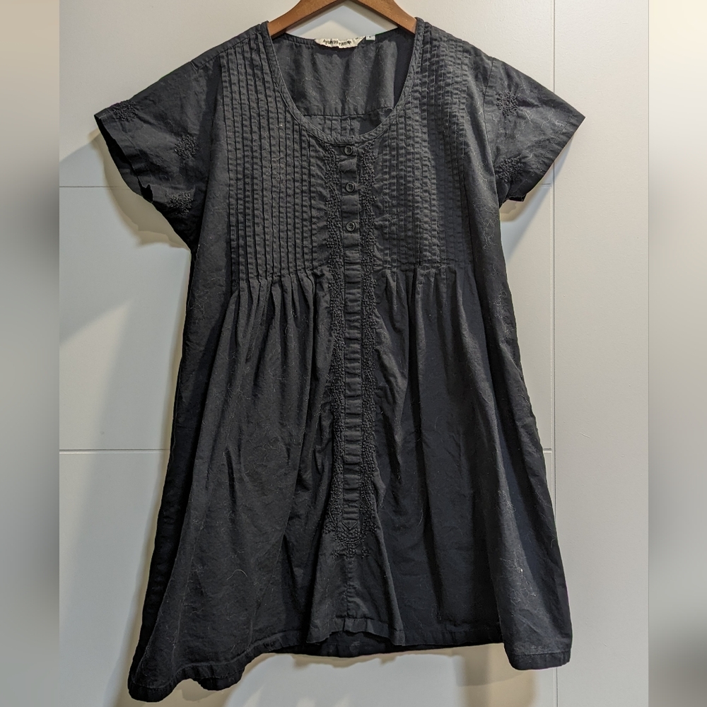 Black tunic in size Large